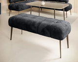 Gray MILO Pouffes upholstered bench with tufted design on a light floor.
