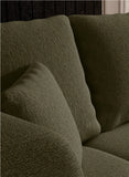 Close-up of a textured green Albion sofa with cushions.