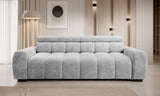 Bull 4 seater Gray sofa in a modern living room with wooden walls and a lamp.