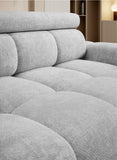Gray upholstered sofa Bull with tufted design in a room setting
