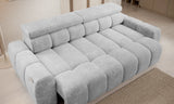 Gray sofa 3 seater sofa Bullin a room with light-colored walls and flooring