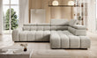 BULL L Gray sectional L SHAPE CORNER sofa in a modern living room with large windows and decor.