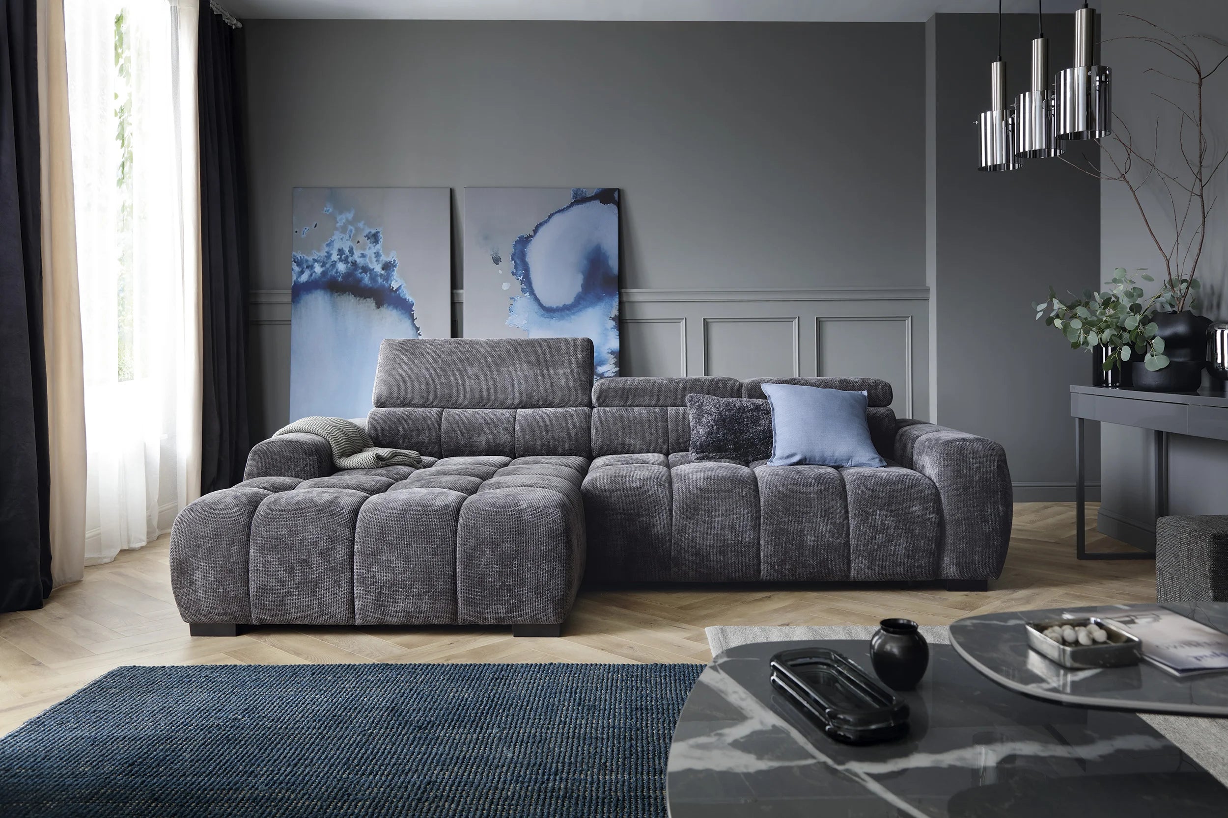 Gray BULL S l shape corner sofa in a modern living room with abstract art and decor.
