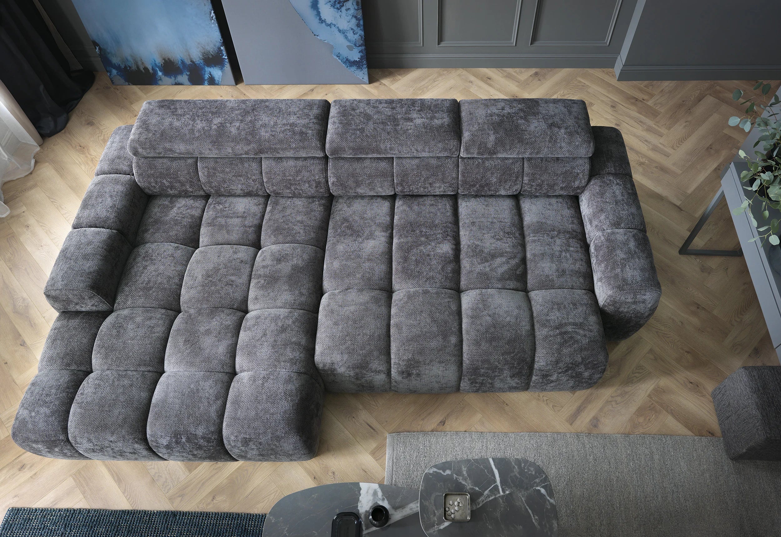 BULL S corner sofa in a living room setting with wooden flooring.