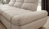 Close-up of a textured beige Galiano S - Corner Sofa Bed with Ottoman Storage in a room with large windows.