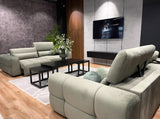LAGOS SOFA WITH ELECTRIC SEAT ADJUSTMENT in Modern living room with gray sectional sofa, coffee table, and TV on the wall.