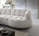 VELPA S Grey tufted  Power Chaise Corner Sofa with Motorised Seat Extension in a living room setting with a neutral color palette.