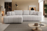 Modern living room with a gray Corner Sofa Bed ALBIO S and a coffee table.